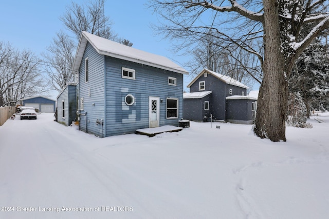 view of snow covered house