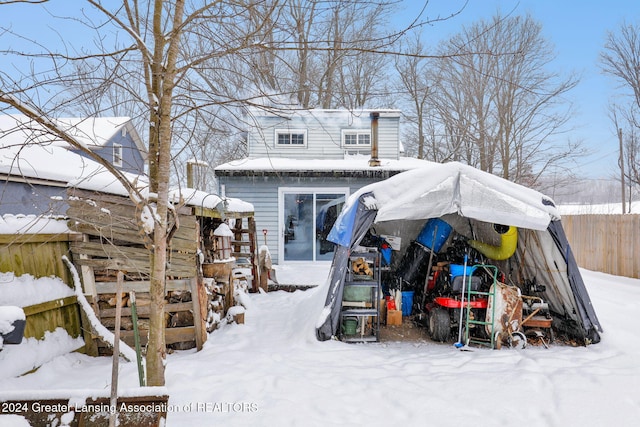 view of snow covered property