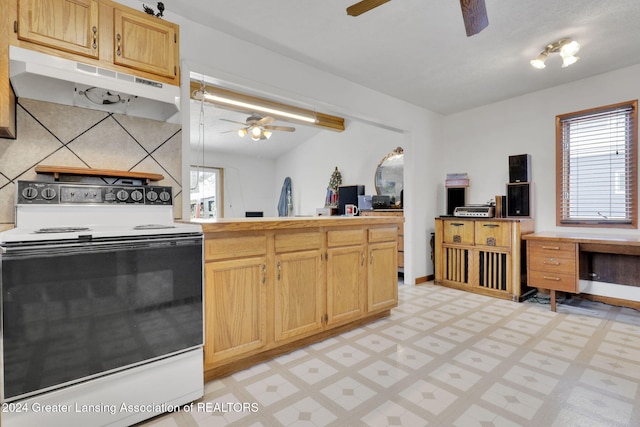 kitchen featuring lofted ceiling, light brown cabinetry, backsplash, and white electric stove