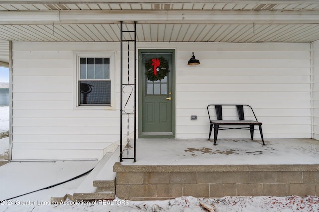 property entrance with a porch