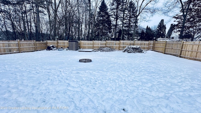 view of yard covered in snow