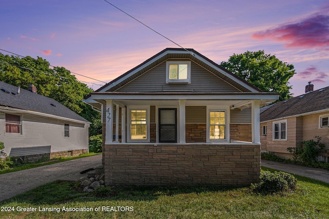 bungalow featuring covered porch