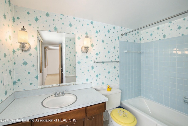 full bath featuring shower / bathtub combination, vanity, toilet, and wallpapered walls