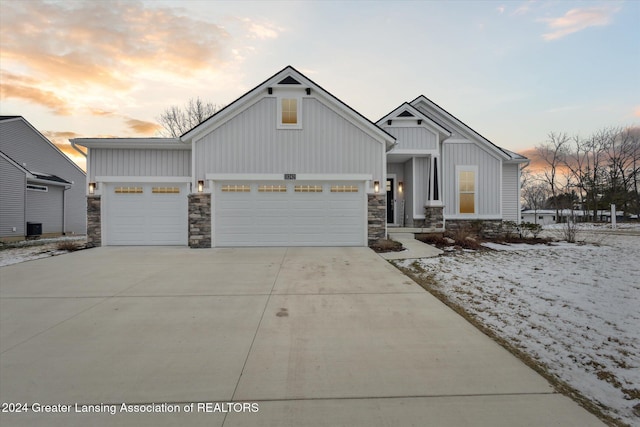 view of front of property with a garage