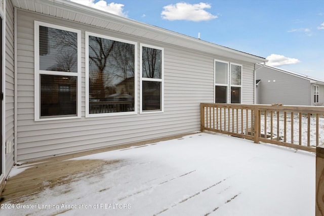 view of snow covered deck