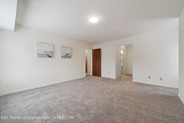 unfurnished room featuring carpet floors