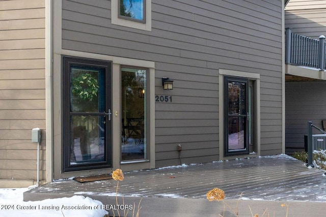 entrance to property featuring central AC unit