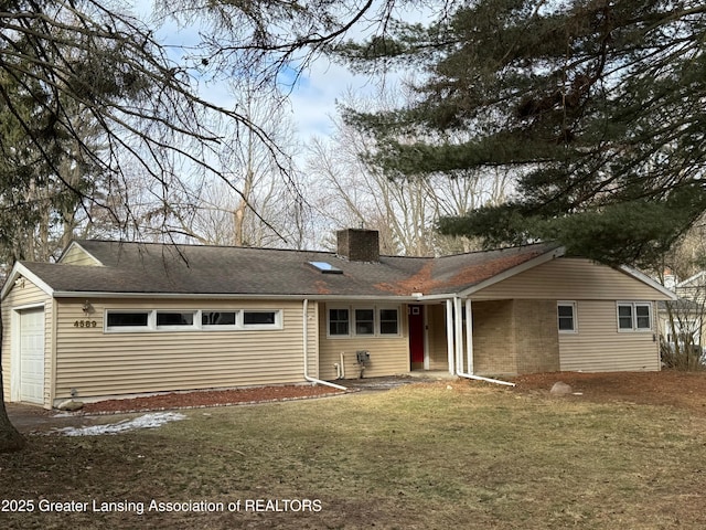 ranch-style home featuring central air condition unit, roof with shingles, a front yard, a garage, and a chimney