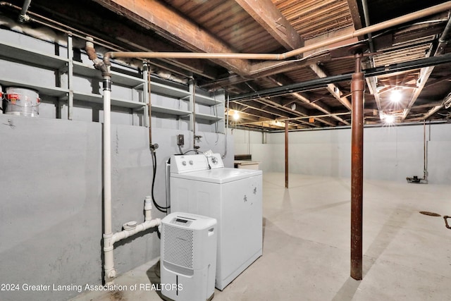 basement featuring washing machine and dryer