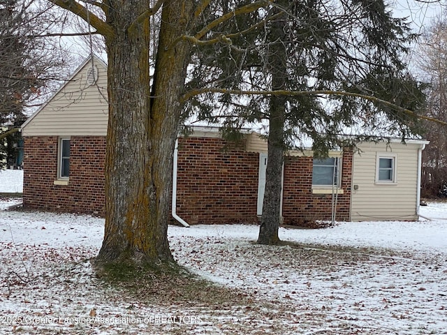 view of snow covered property