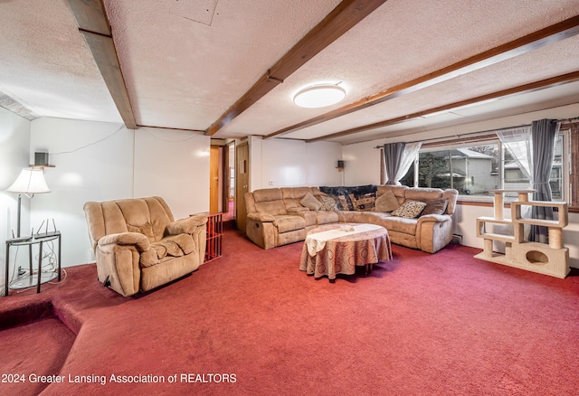 living room with a textured ceiling, beamed ceiling, and carpet floors