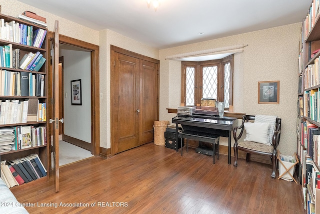 living area with dark hardwood / wood-style flooring