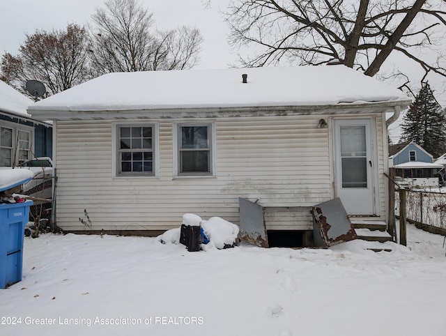 view of snow covered property