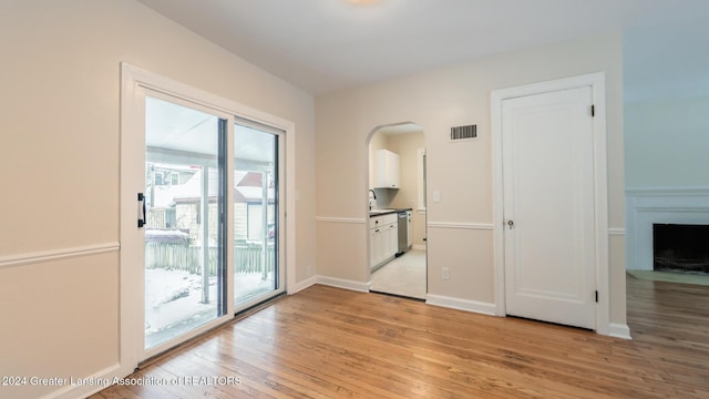 interior space with sink and light hardwood / wood-style floors