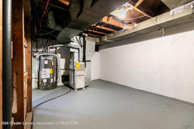 basement with heating unit and gas water heater