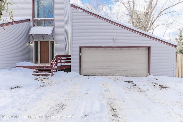 exterior space with a garage