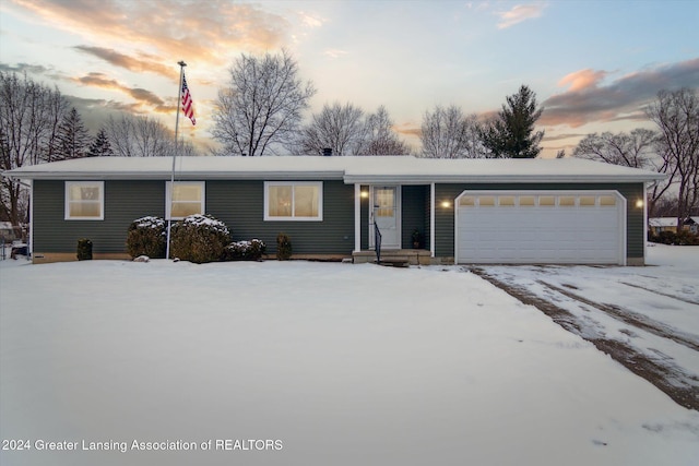 ranch-style home with a garage