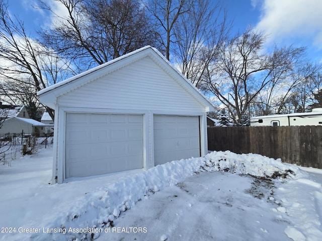 view of snow covered garage