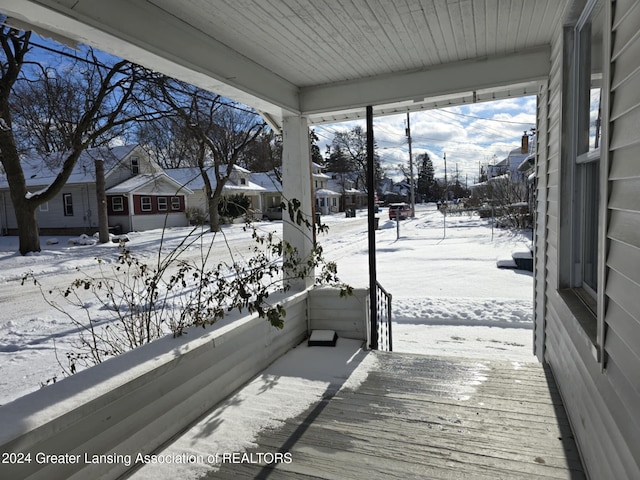 view of snow covered deck