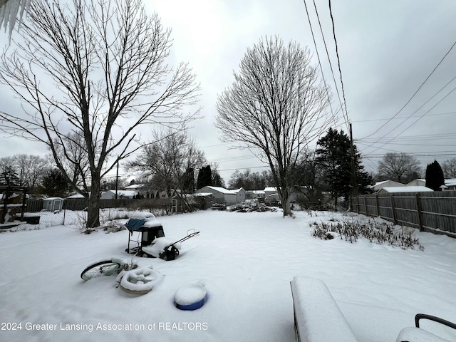 view of snowy yard