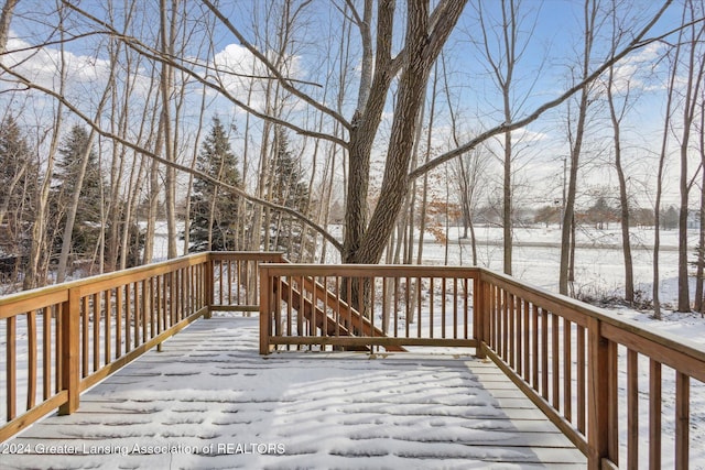 view of snow covered deck