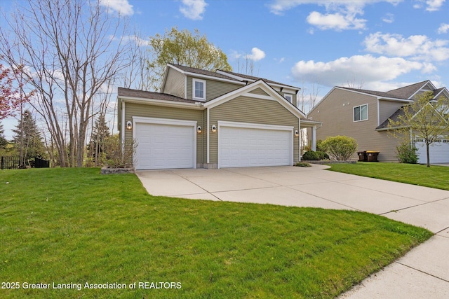 4526 Bison Dr, Holt, MI 48842 - traditional home with driveway, a front yard, and a garage