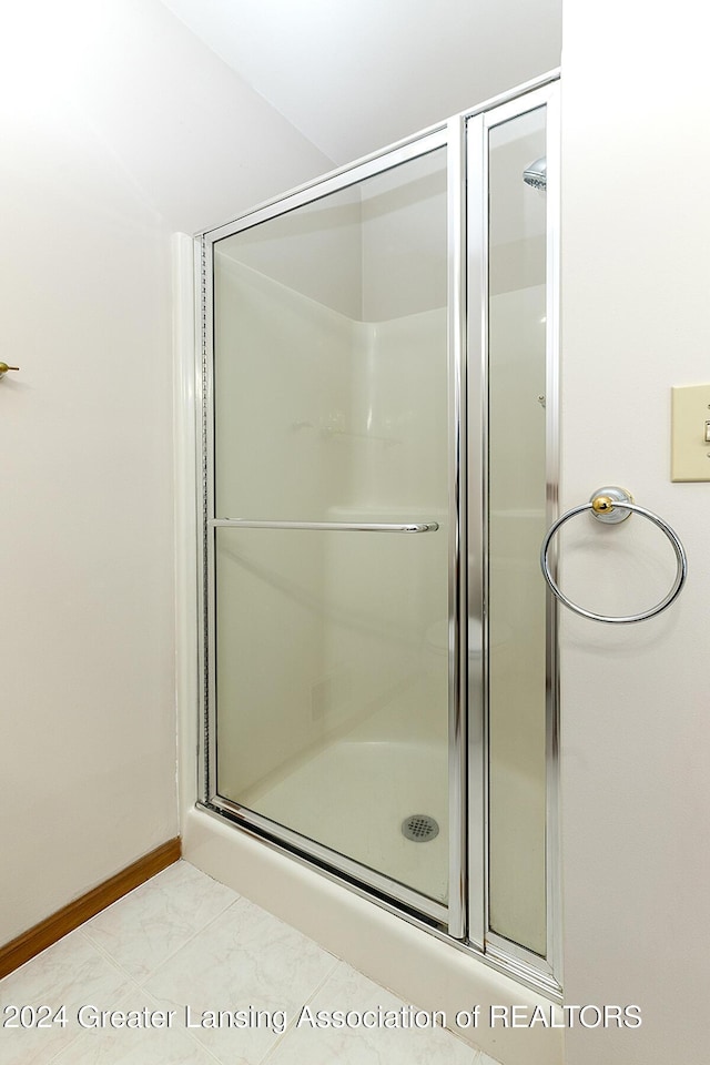 bathroom featuring walk in shower