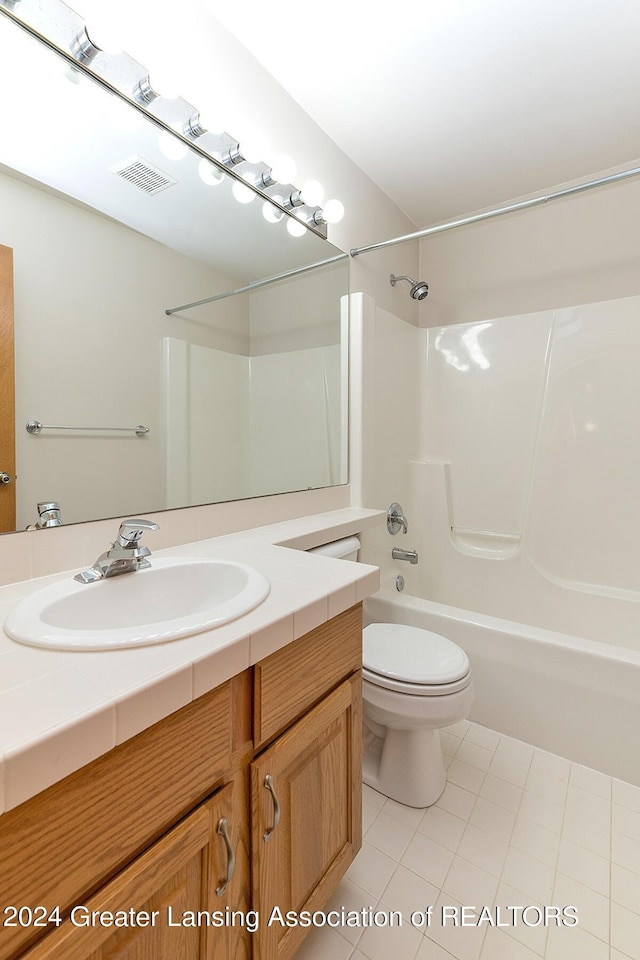 full bathroom featuring vanity, toilet, shower / washtub combination, and tile patterned flooring