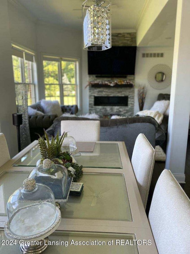 dining area featuring crown molding