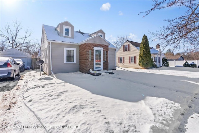 view of front of property with an outbuilding and a garage