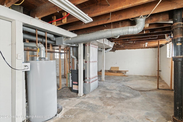 basement with heating unit and water heater