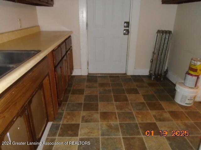 kitchen featuring radiator