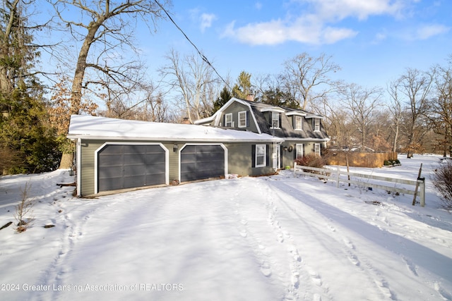 view of front of property featuring a garage