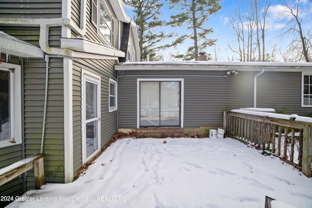 view of snow covered deck