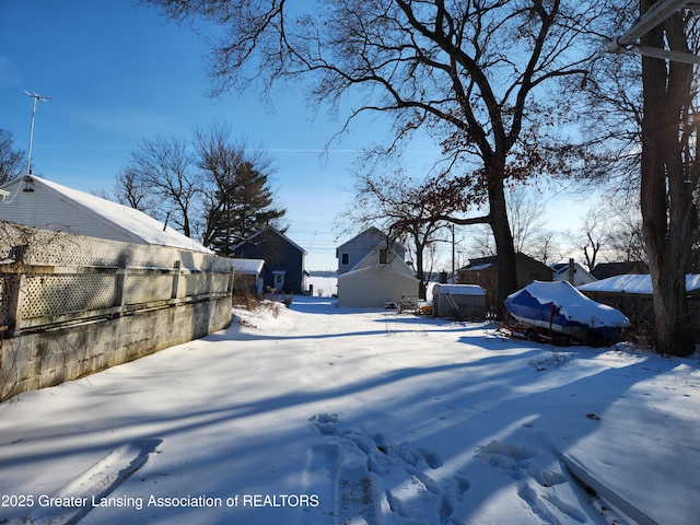 view of yard covered in snow