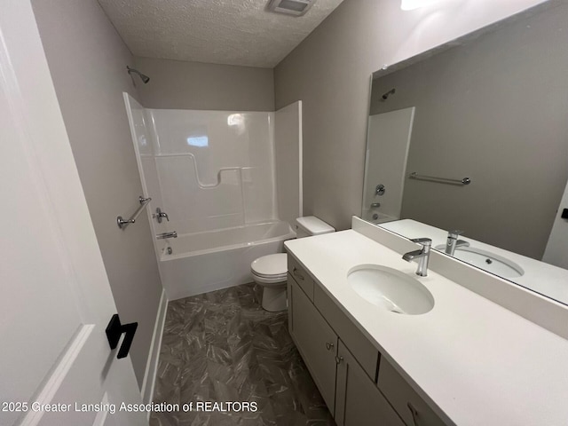 6097 Southridge Rd, East Lansing, MI 48823 - full bathroom with a textured ceiling, toilet, vanity, and shower / bath combination