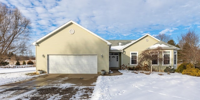 view of front of home with a garage