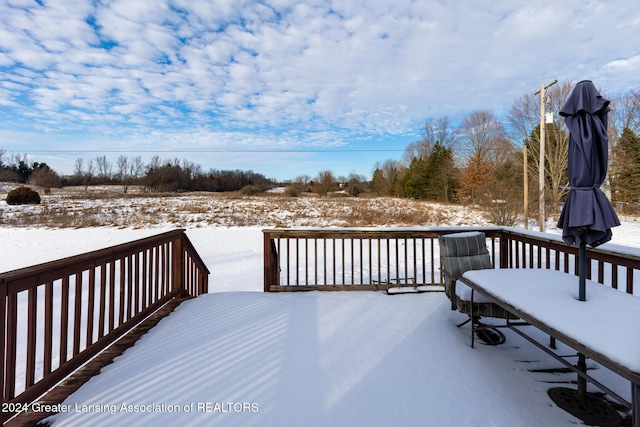 view of snow covered deck