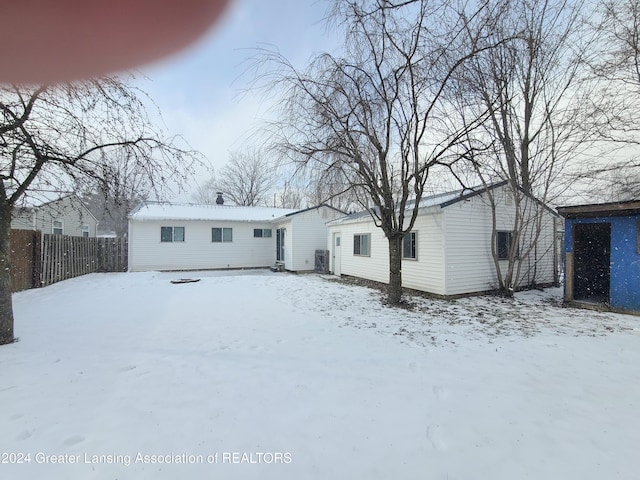 view of snow covered house