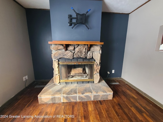 details with a fireplace and hardwood / wood-style floors