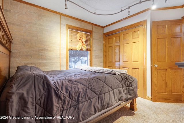 bedroom featuring carpet flooring and ornamental molding