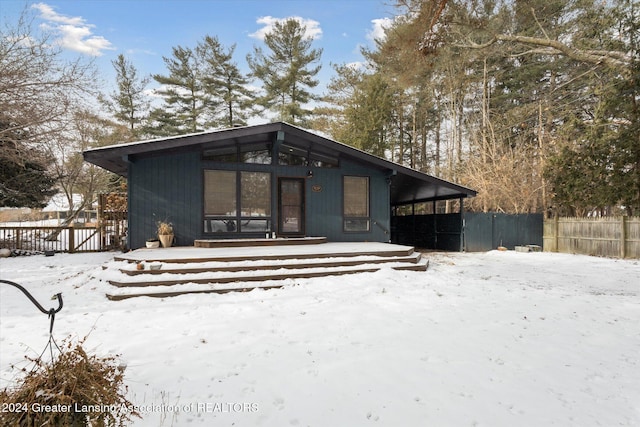 view of snow covered property