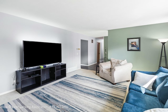 living room featuring light colored carpet