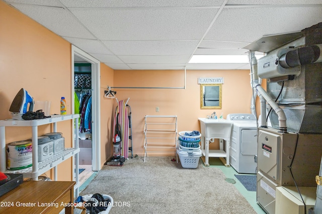 laundry room with washer / dryer and sink