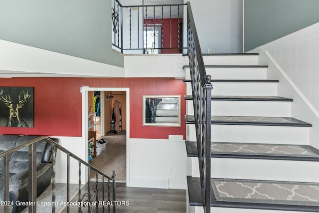 stairway with a high ceiling