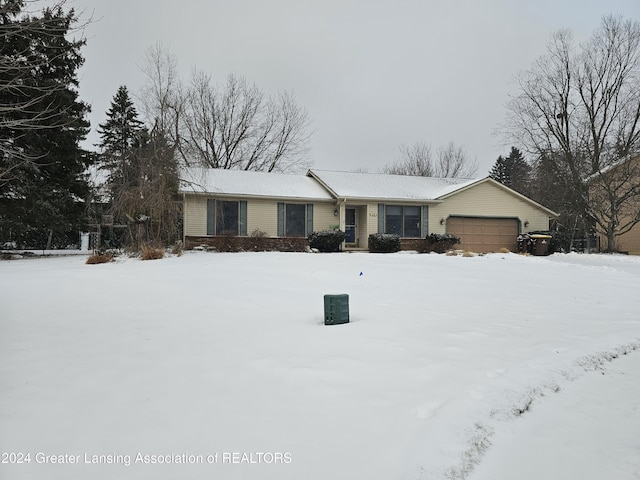 single story home featuring a garage