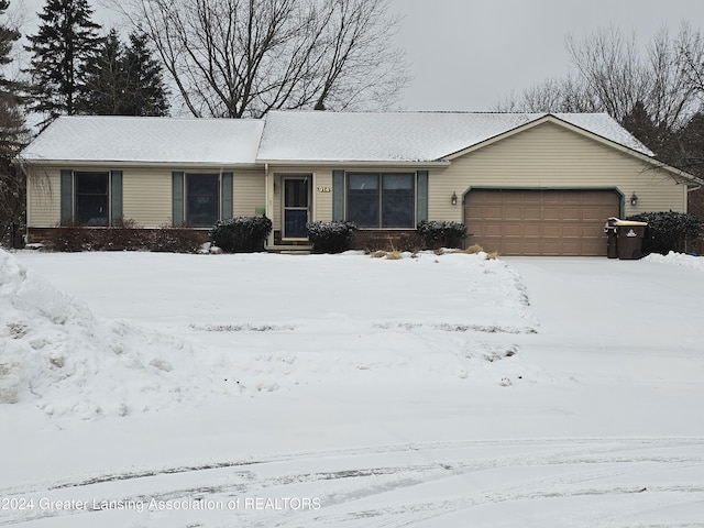 single story home with a garage