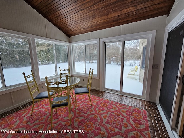 sunroom / solarium featuring wood ceiling and vaulted ceiling