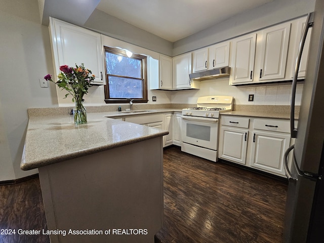 kitchen featuring white cabinetry, white range with gas cooktop, and kitchen peninsula