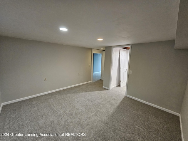 empty room featuring carpet flooring